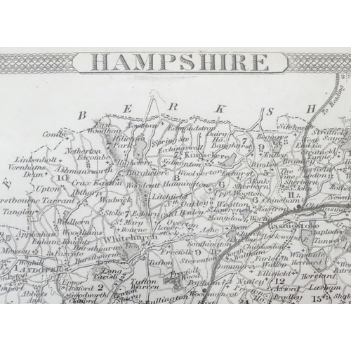 803 - A 19thC monochrome engraved county map after Thomas Moule depicting Hampshire with a vignette view o... 