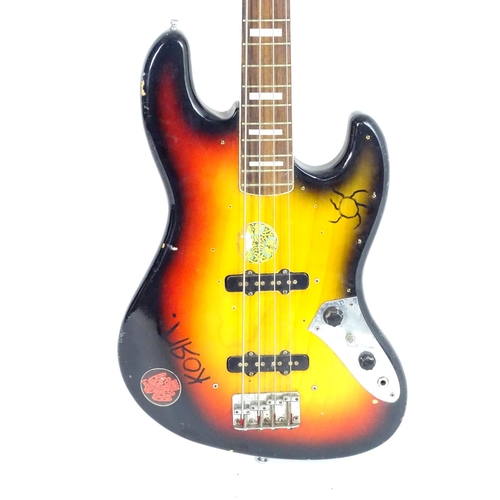 1228 - Musical Instrument: a c1980s Maya MJB-70 bass guitar, with sunburst finish, neck binding and block i... 