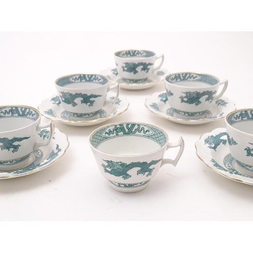 168 - A quantity of Booths tea cups and saucers in the pattern Dragon with gilt highlights. Cups approx. 2... 