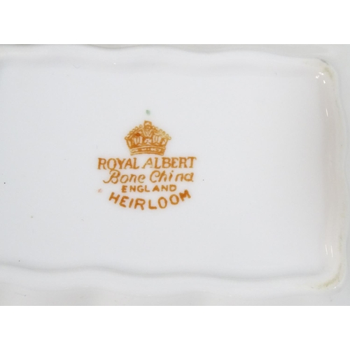 177 - A large quantity of Royal Albert tea and dinner wares in the pattern Heirloom, comprising dinner pla... 