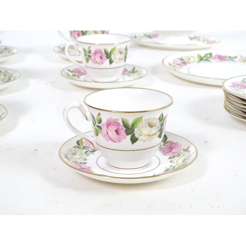 178 - A large quantity of Royal Worcester tea and dinner wares in the pattern Royal Garden - Elgar, compri... 