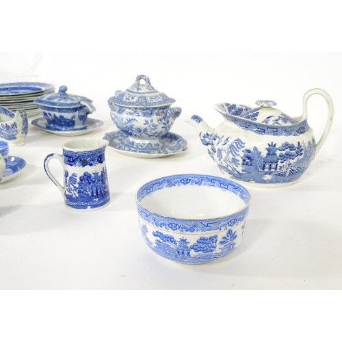 179 - A large quantity of assorted blue and white wares to include Wedgwood Willow pattern teapot, a Wedgw... 