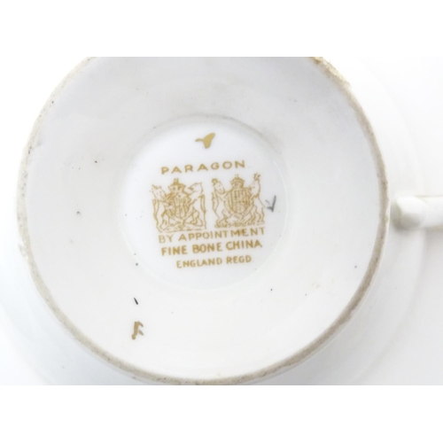 182 - A large quantity of 19thC and later assorted cups and saucers to include Copeland Garrett with hand ... 