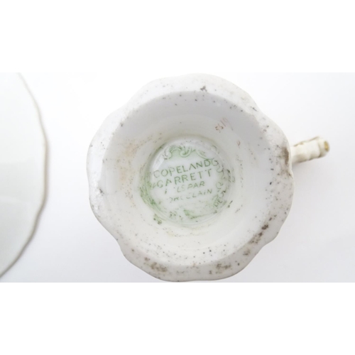 182 - A large quantity of 19thC and later assorted cups and saucers to include Copeland Garrett with hand ... 