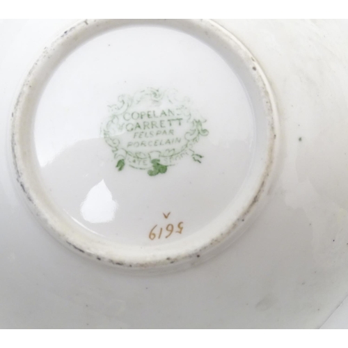 182 - A large quantity of 19thC and later assorted cups and saucers to include Copeland Garrett with hand ... 