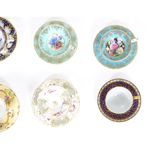 182 - A large quantity of 19thC and later assorted cups and saucers to include Copeland Garrett with hand ... 