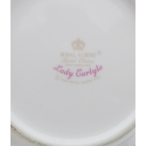 184 - A quantity of Royal Albert tea and dinner wares in the pattern Lady Carlyle, to include teapot, teap... 