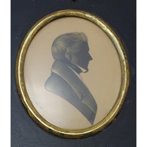 829 - A 19thC oval watercolour silhouette portrait miniature of a man with gilt highlights. Approx. 5 3/4