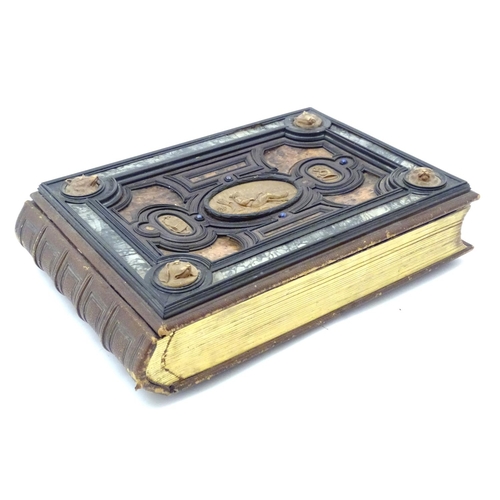 839 - A late 19thC Austrian box formed as a book by Auguste Klein, the cover with inlaid carved panels dep... 