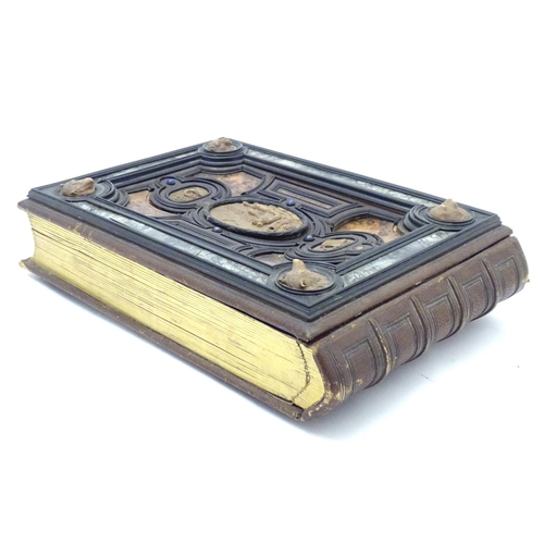 839 - A late 19thC Austrian box formed as a book by Auguste Klein, the cover with inlaid carved panels dep... 