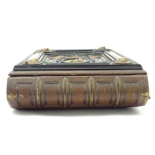 839 - A late 19thC Austrian box formed as a book by Auguste Klein, the cover with inlaid carved panels dep... 