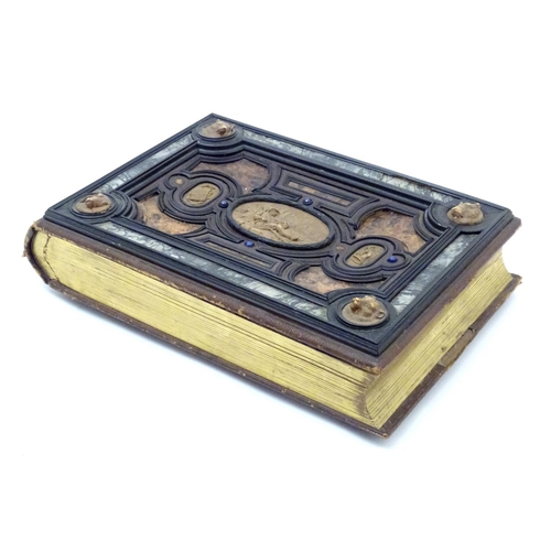 839 - A late 19thC Austrian box formed as a book by Auguste Klein, the cover with inlaid carved panels dep... 