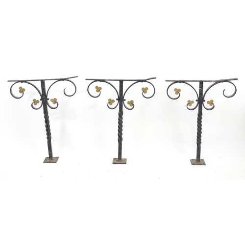 1535 - Salvage & Architectural Antiques: a trio of wrought iron railing upstands, each with black painted f... 