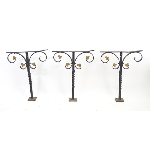 1535 - Salvage & Architectural Antiques: a trio of wrought iron railing upstands, each with black painted f... 