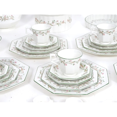 172 - A large quantity of Johnson Brothers tea and dinner wares in the pattern Eternal Beau with flower an... 