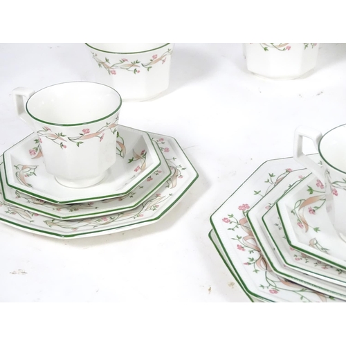 172 - A large quantity of Johnson Brothers tea and dinner wares in the pattern Eternal Beau with flower an... 