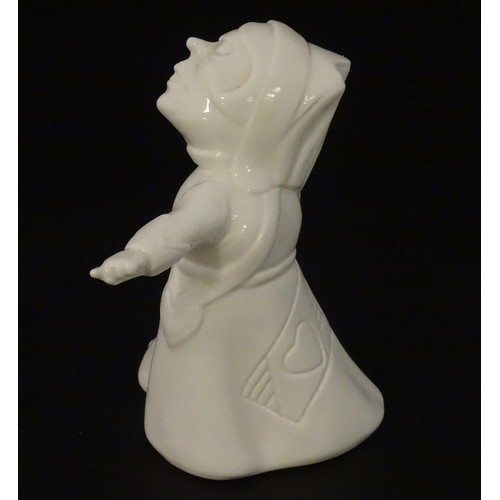 138 - A ceramic figure of the Queen of Hearts from Lewis Carroll's Alice in Wonderland. Approx. 5 1/2