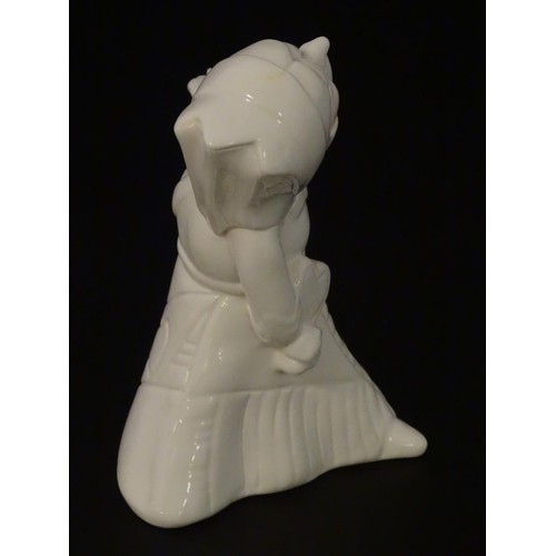 138 - A ceramic figure of the Queen of Hearts from Lewis Carroll's Alice in Wonderland. Approx. 5 1/2