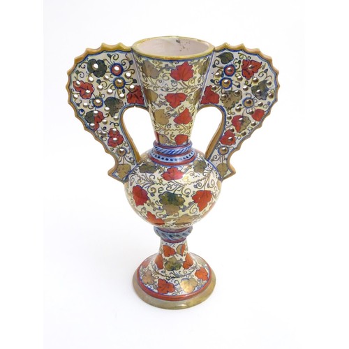 175 - A late 20thC Italian Gu-shaped vase with large wavy edged handles with pierced decoration, decorated... 