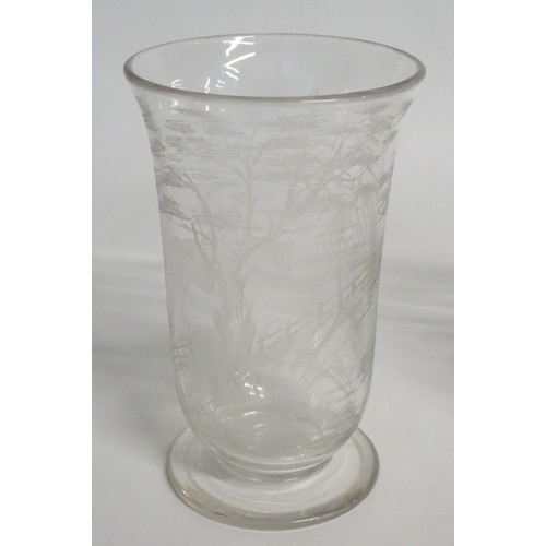 188 - Two items of glassware comprising 20thC footed vase with a flared rim, with etched decoration depict... 