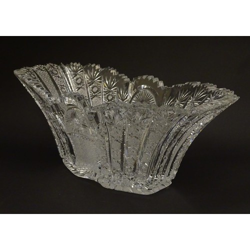 194 - An early 20thC cut glass / crystal table centre piece / fruit bowl 13 1/2'' long .