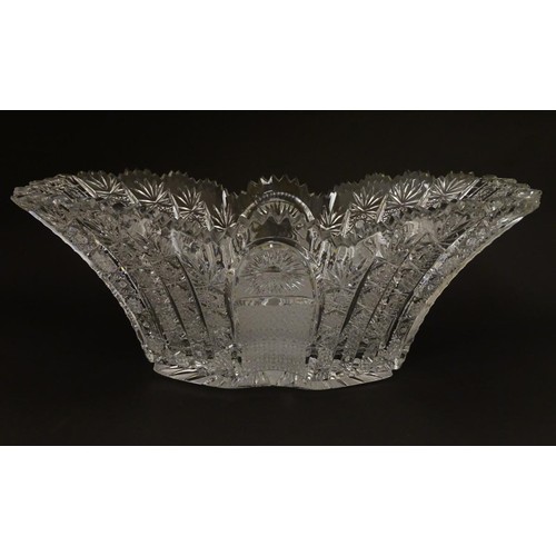 194 - An early 20thC cut glass / crystal table centre piece / fruit bowl 13 1/2'' long .