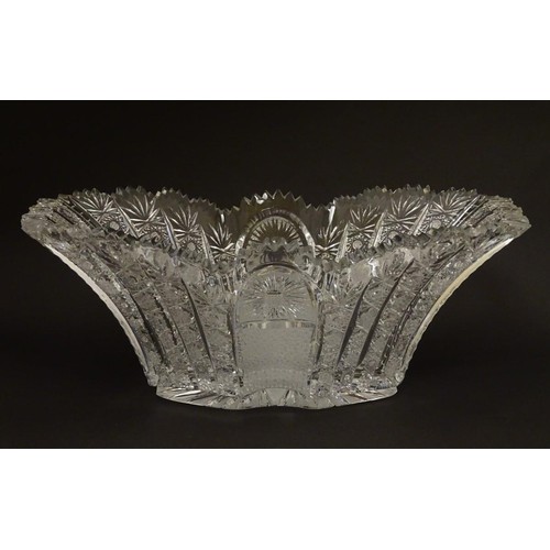 194 - An early 20thC cut glass / crystal table centre piece / fruit bowl 13 1/2'' long .