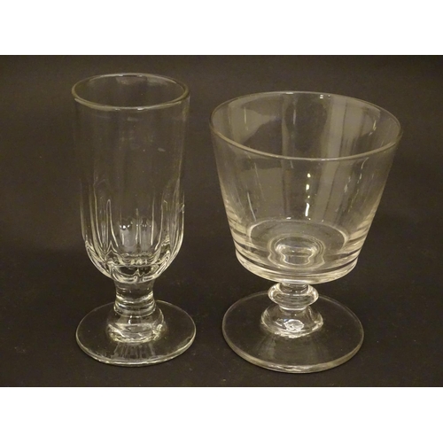 212 - Drinking glasses : A 19thC glass rummer together with a fluted ale glass. Tallest approx 5 1/4