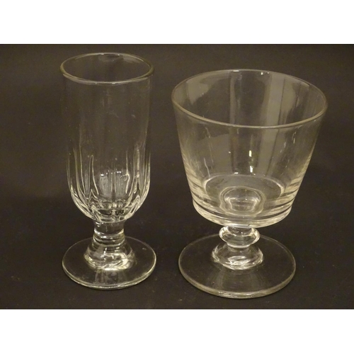 212 - Drinking glasses : A 19thC glass rummer together with a fluted ale glass. Tallest approx 5 1/4