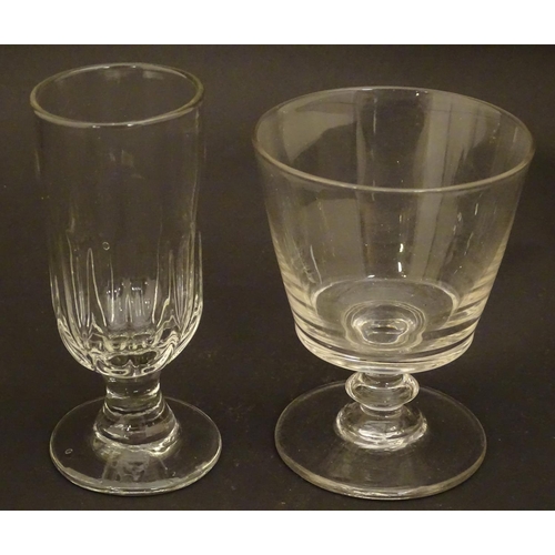 212 - Drinking glasses : A 19thC glass rummer together with a fluted ale glass. Tallest approx 5 1/4