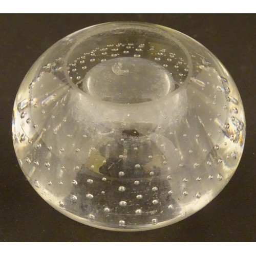 216 - Glass : A late Victorian clear glass counter top match holder having air inclusions , 2 3/4'' diamet... 