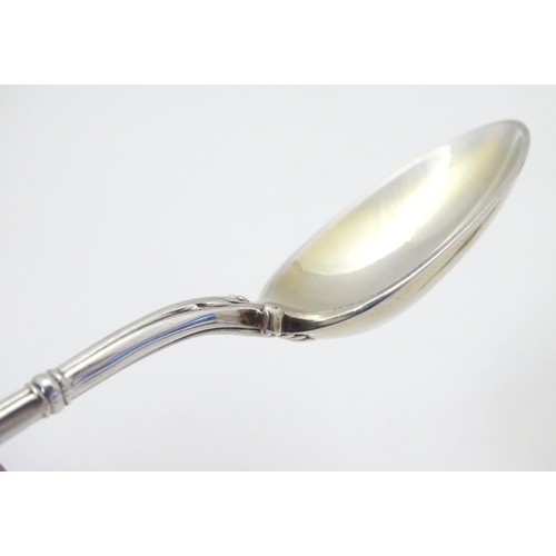 419 - A silver teaspoon, the handle decorated with tall ship / galleon. Hallmarked Sheffield 1892 maker Jo... 