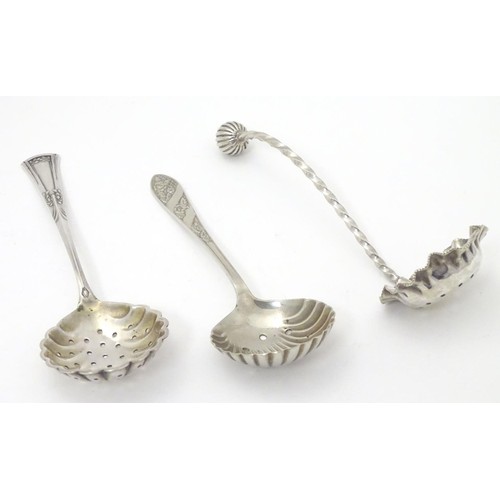 423 - Three various silver plated sifter spoons.  Approx 5 1/2