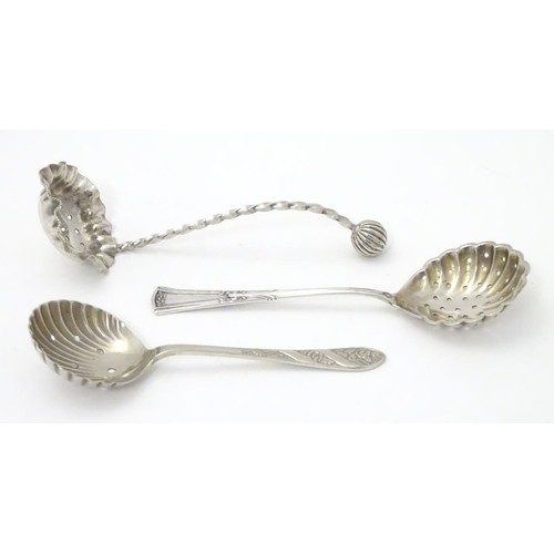 423 - Three various silver plated sifter spoons.  Approx 5 1/2