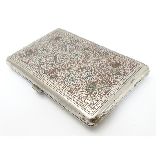 424 - A white metal cigarette case, the eastern/ Islamic style decoration having red and green enamel styl... 