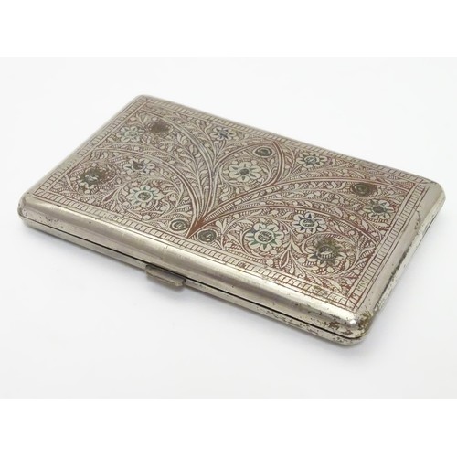 424 - A white metal cigarette case, the eastern/ Islamic style decoration having red and green enamel styl... 