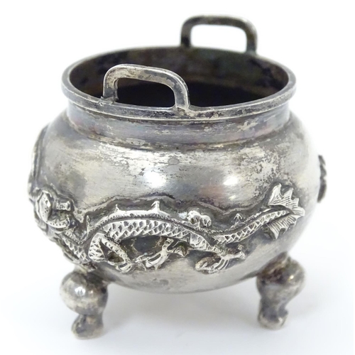 436 - Chinese export silver: A white metal salt formed as a stylised censer with dragon detail, marked und... 