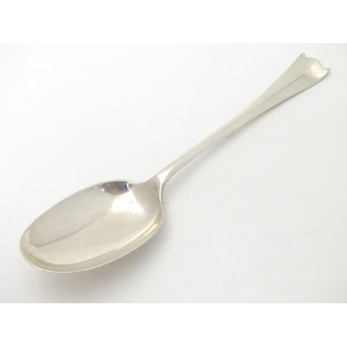 450 - Silver rat-tail dessert spoon with unusual shaped handle. Hallmarked Sheffield 1929 maker William Hu... 