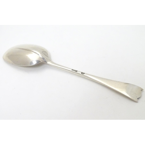 450 - Silver rat-tail dessert spoon with unusual shaped handle. Hallmarked Sheffield 1929 maker William Hu... 