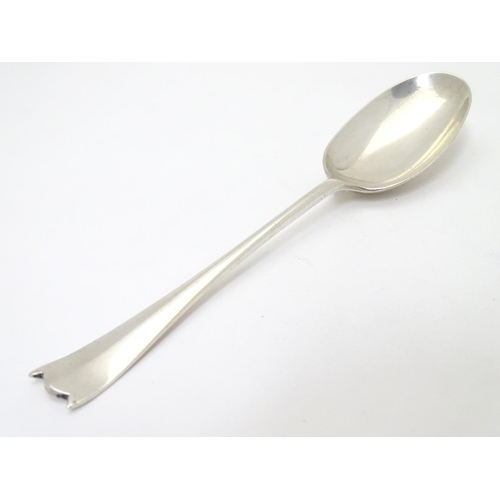 450 - Silver rat-tail dessert spoon with unusual shaped handle. Hallmarked Sheffield 1929 maker William Hu... 