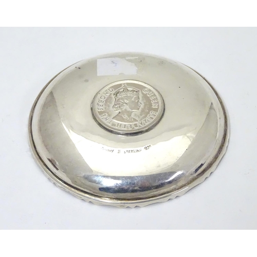 452 - A Chinese Export silver pin dish of circular form with inset  QEII Hong Kong Dollar to centre.  3 1/... 