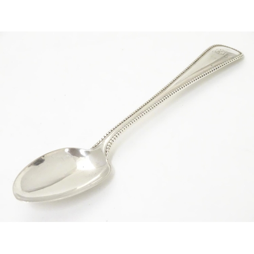 464 - A Victorian Scottish silver old English pattern teaspoon with bead edge. Hallmarked Edinburgh 1866 m... 