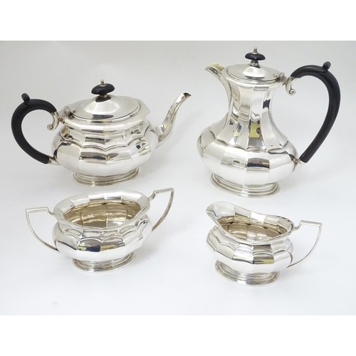 493 - A silver plate 4 piece tea set comprising teapot, hot water pot, sugar and cream jug (4)