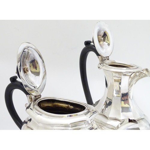 493 - A silver plate 4 piece tea set comprising teapot, hot water pot, sugar and cream jug (4)