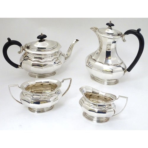 493 - A silver plate 4 piece tea set comprising teapot, hot water pot, sugar and cream jug (4)