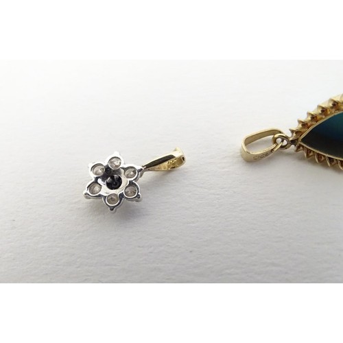 558 - A 9ct gold pendant and chain, the pendant set with turquoise cabochon, together with a 9ct gold chai... 