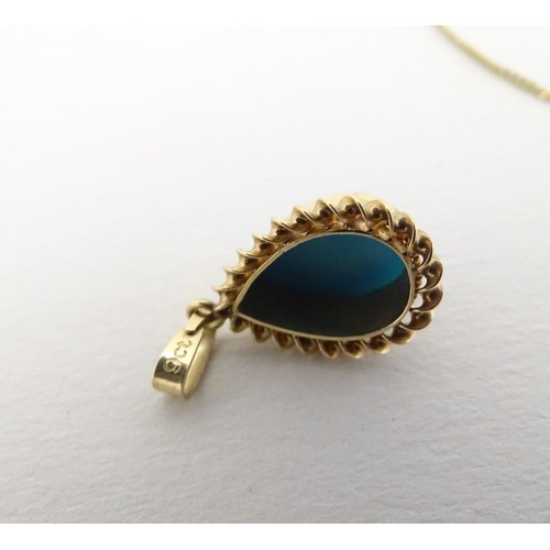 558 - A 9ct gold pendant and chain, the pendant set with turquoise cabochon, together with a 9ct gold chai... 