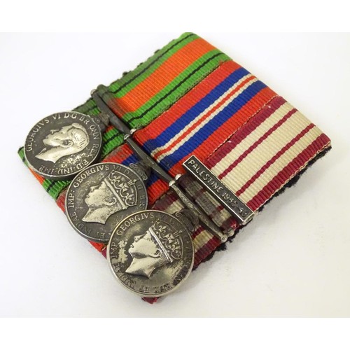 666 - Militaria: a miniature campaign medal group, comprising WWII/WW2/Second World War Defence and War me... 