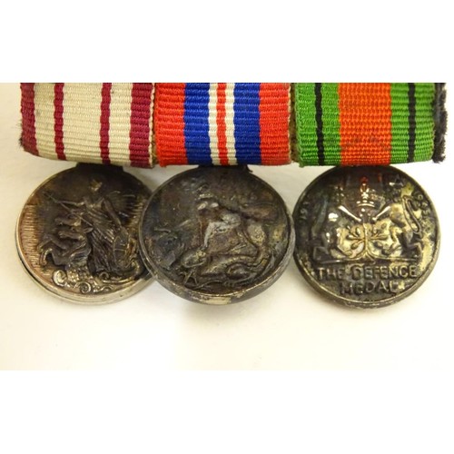 666 - Militaria: a miniature campaign medal group, comprising WWII/WW2/Second World War Defence and War me... 