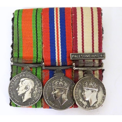 666 - Militaria: a miniature campaign medal group, comprising WWII/WW2/Second World War Defence and War me... 